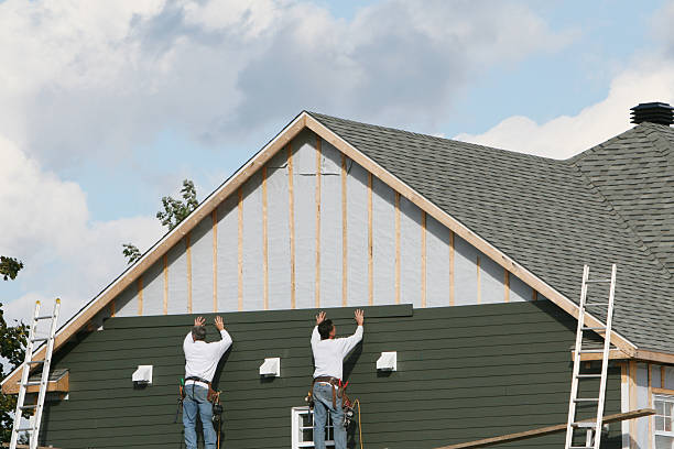 Professional Siding Installation technician working in Canton, OH